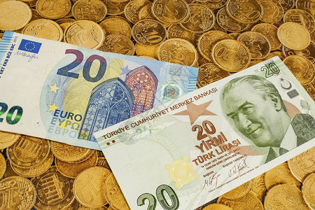 在背景上关闭土耳其里拉和欧元纸币图片