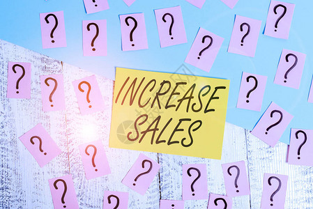 概念手写显示增加销售额概念意味着大量客户完成了销售周期木桌上图片