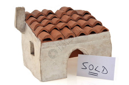 房地产交易概念用房子卖掉的近身背景图片