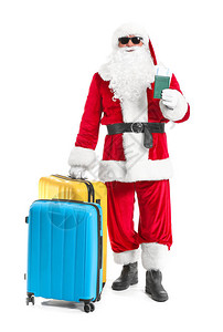 带行李和白背景文件的圣诞老人休假图片