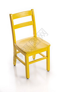 木制儿童椅子漆黄色在白色图片