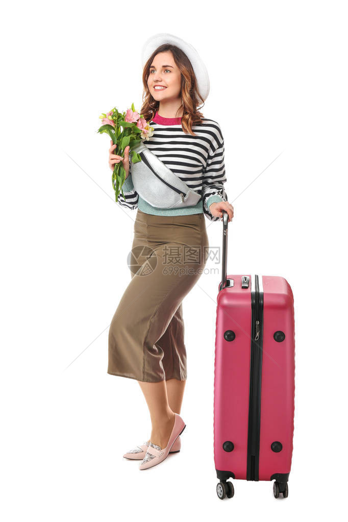 携带白色背景行李和鲜花的女图片
