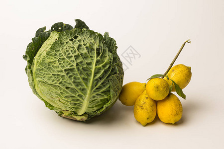 生鲜的卷心菜和柠檬背景图片