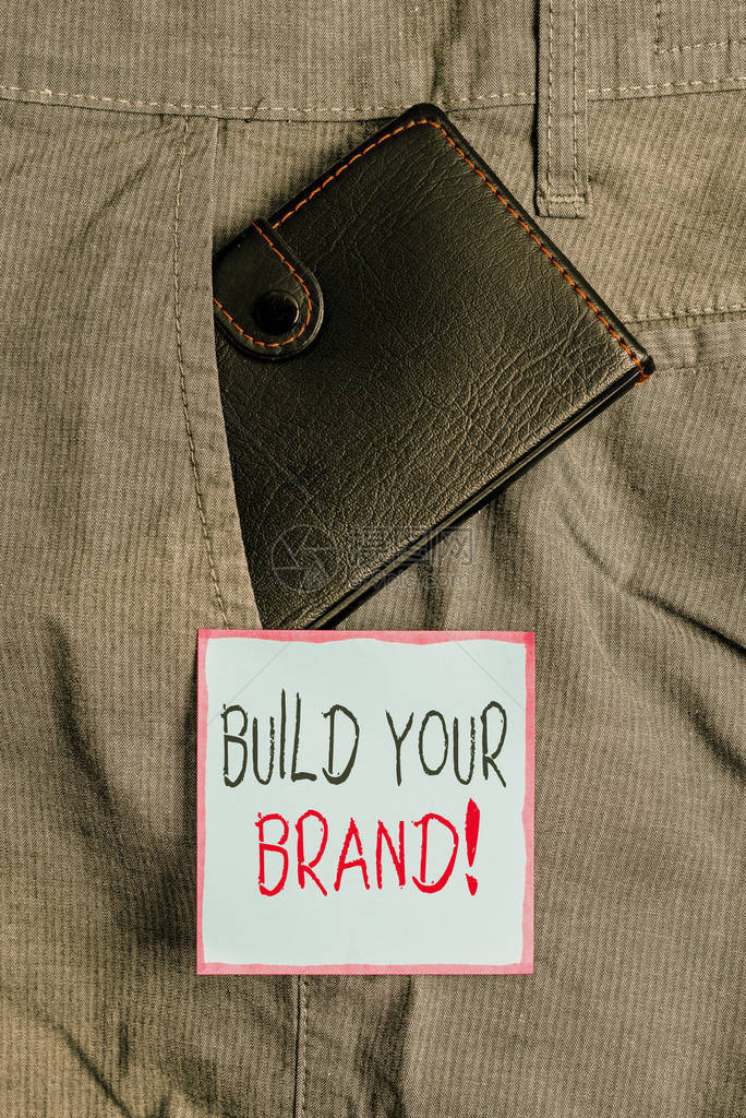 显示建立您的品牌的书写笔记创造或提高客户对产品的知识和意见的商业理念裤前袋内靠近符图片