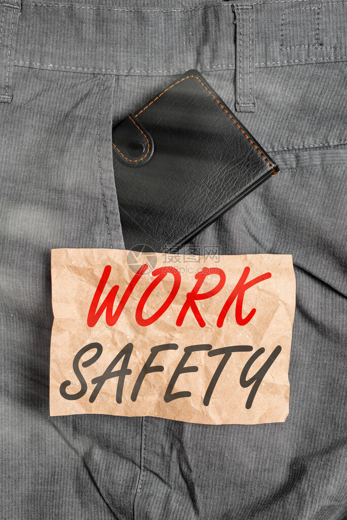 文字书写文本工作安全商业照片展示了公司为保护工人健康而采取的预防措施男裤前袋内靠近符图片