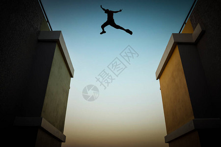 跳过障碍的概念一个人在两座高楼之背景图片