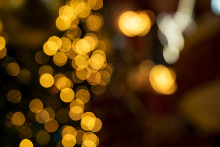 圣诞灯和新年的彩色橙散景背图片