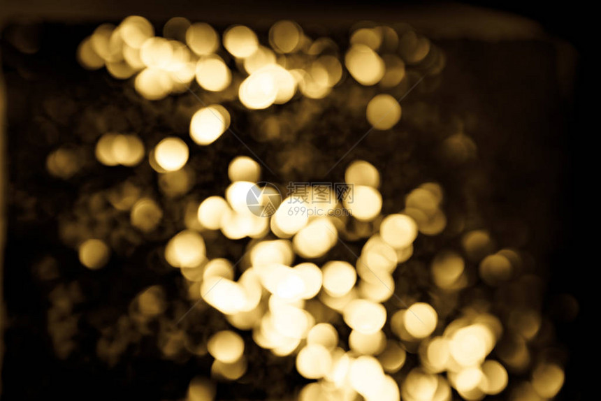 节日叠加效果金色圆圈散景节日闪光深色背景圣诞节图片