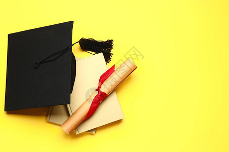 毕业帽子彩色背景图片