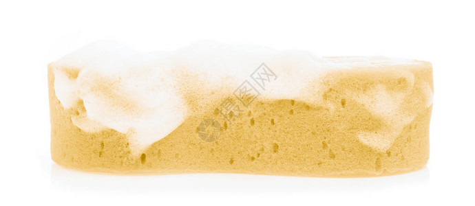 海绵与泡沫肥皂泡沫隔离在白色背景图片