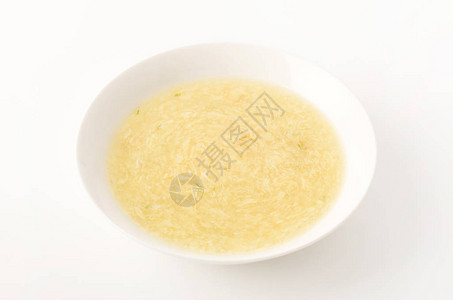 白盘甜玉米蛋花汤背景图片