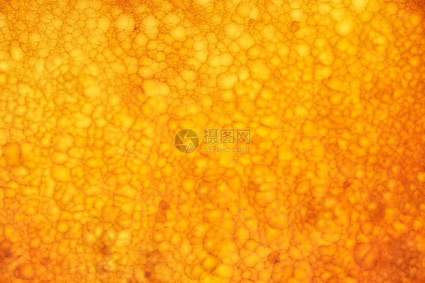 缟玛瑙墙背景蜂蜜色缟玛瑙材料的质地图片