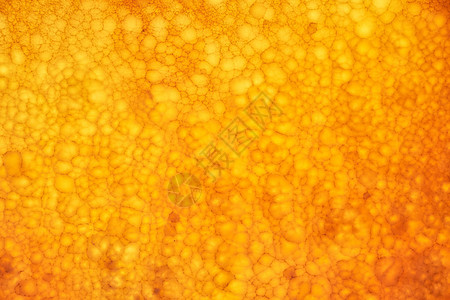 缟玛瑙墙背景蜂蜜色缟玛瑙材料的质地图片
