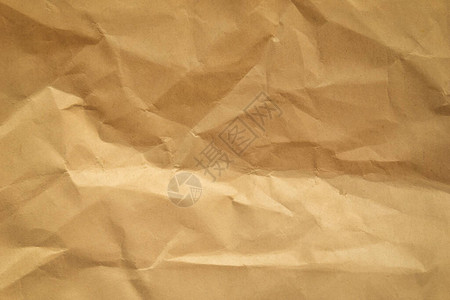 棕色皱巴的包装纸背景图片