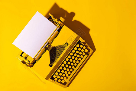 黄色明亮的打字机黄色写作博客新想法和创造力的象征复制图片