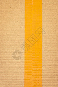 工业用棕色纸盒包装上的透明胶带棒用于设图片