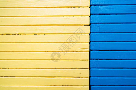 蓝色和黄色油漆的木墙用图片