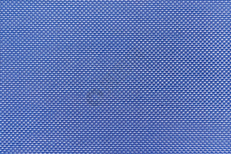 具有模式背景的蓝纺织品布图片