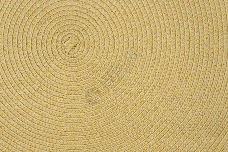 编织的黄色柳条稻草背景或纹理图片