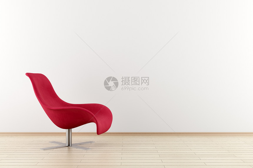 白墙前的红色扶手椅图片