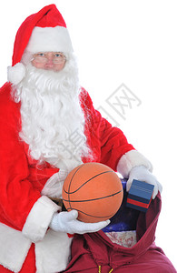 圣诞老人拿着篮球和他的玩具图片