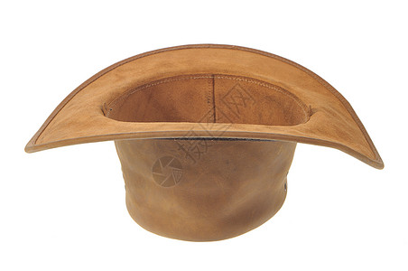 反向棕色牛仔帽作为原始花盆或用于慈善白背景的容器图片