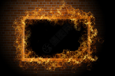 砖墙上有火的空框架图片