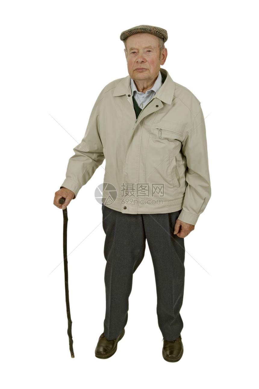 一个老人走着棍子图片
