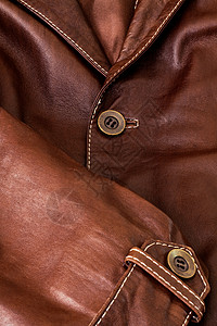 棕色衣服和皮革的细节图片