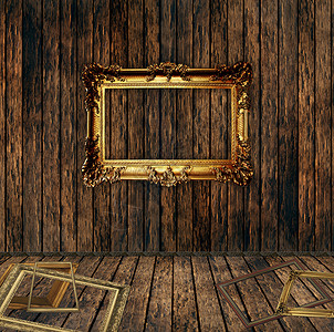 木墙上的古董镀金框架图片