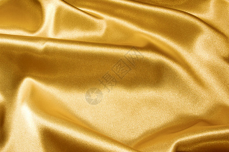 闪亮的波纹金色缎子的背景图片