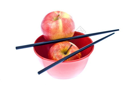 2个苹果和2个棍子的碗图片