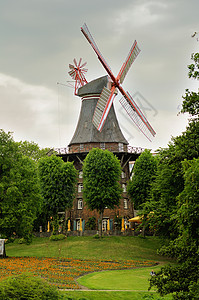 抗阳手册这张照片代表着德国不来梅的沃伦朗格公园的历史风车这幅美丽的照片非常适合您的旅行手册校对背景