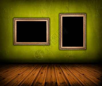 复古绿色内饰墙上挂着空框图片