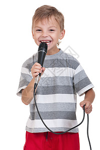 有趣的小男孩歌唱用麦克风孤立图片
