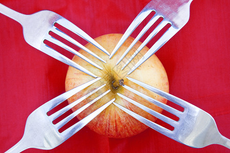 红底有四叉的金红苹果Goldenred以及分享和健康生图片