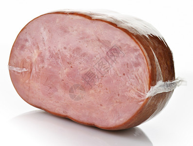 塑料包装中的一块肉特写背景图片