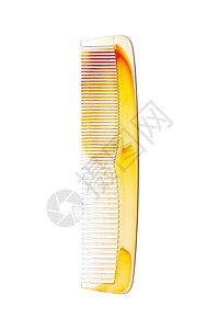 白色背景头发的塑料梳子图片