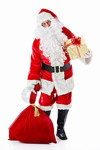 圣诞老人带着一个袋子和一个礼物图片