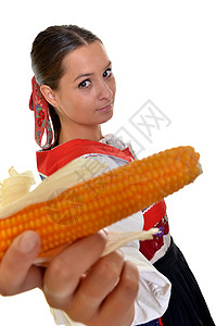 拿着玉米的女人图片