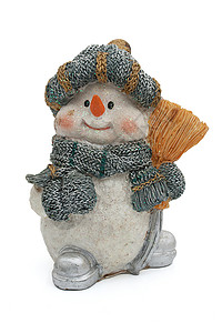 一个戴着帽子手套和围巾的雪人以白图片