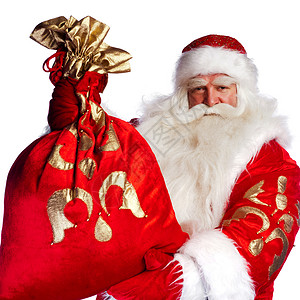 圣诞老人站在白背景上拿着满包礼物的袋子站图片