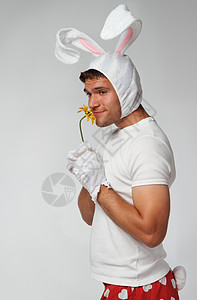 疯狂的东方兔子穿着鲜花兔背景图片