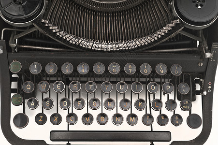 孤立的老式打字机背景图片