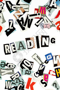 阅读用剪下的字母制成的题词背景图片