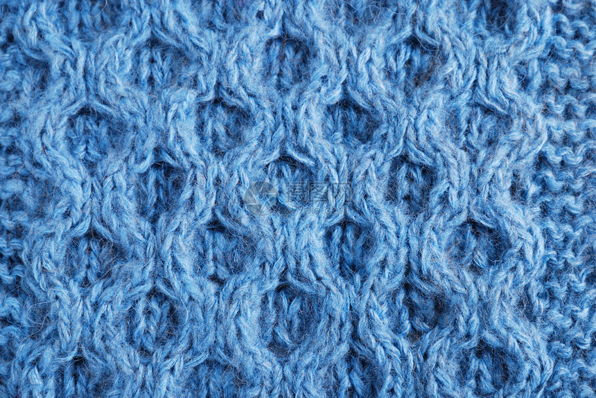蓝色编织布是用手工制成的装饰时带有图片