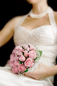 新娘手中的婚纱花束图片