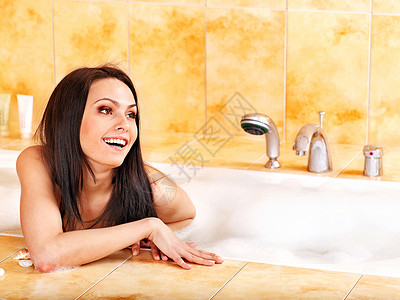蒸汽房年轻漂亮的女人洗热水澡背景