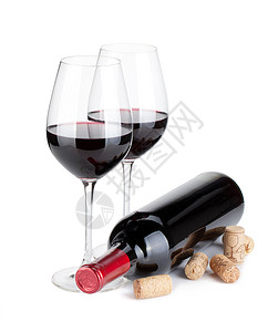 红葡萄酒杯瓶子和软图片