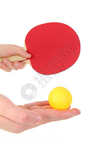 带橙色球的乒乓球拍在白色背景下被隔离图片
